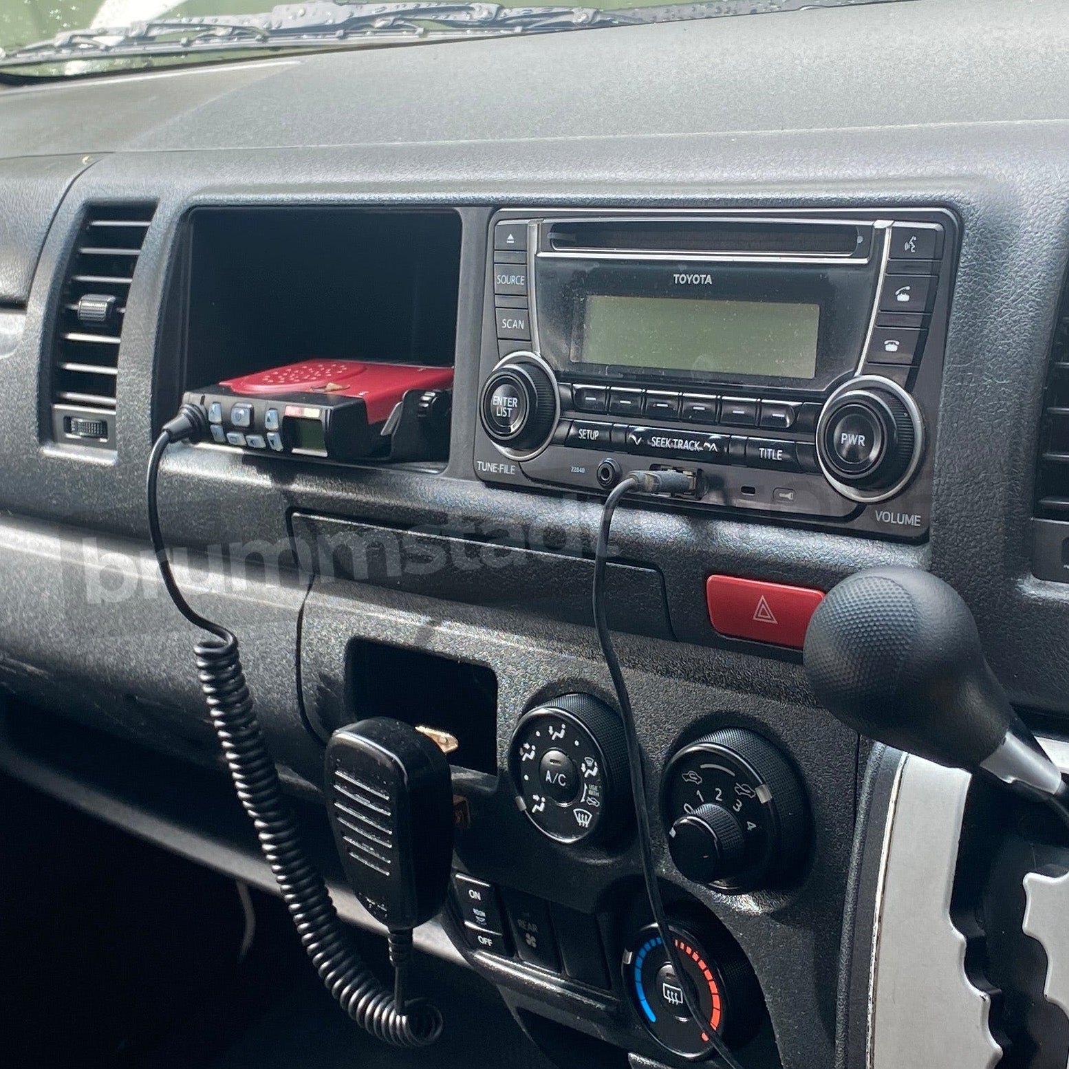 Dark Trim Stereo + Left Storage Pocket
